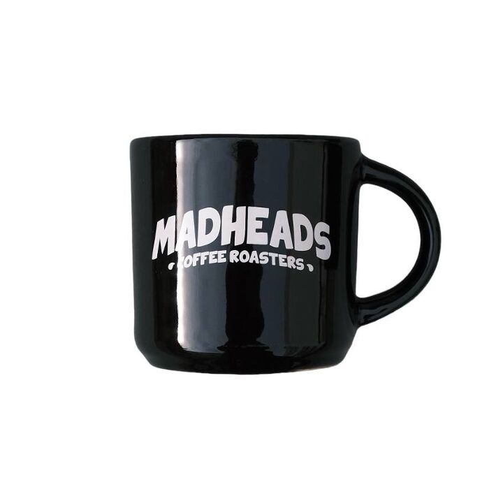 Glossy ceramic mug "Mad Heads"