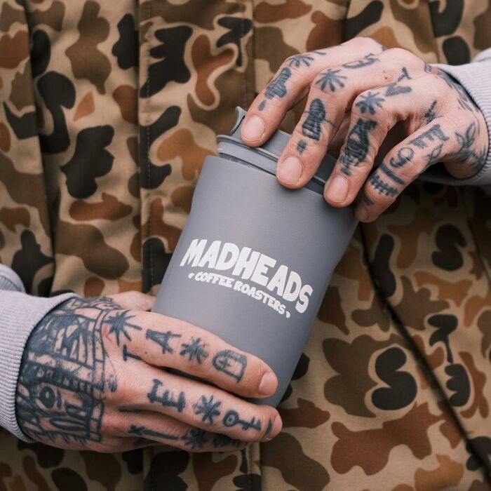 Gray thermal mug “Mad Heads coffee roasters”